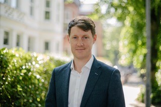 Headshot of Philip Gray